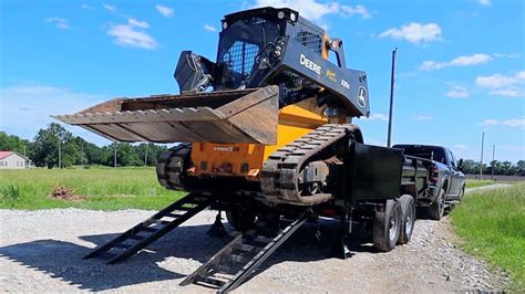 how to load a skid steer on a gooseneck trailer|bobcat skid steer pull on.